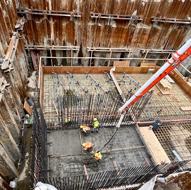 Construction site with concrete mixer truck